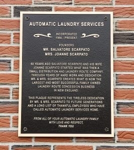 plaque outside automatic laundry