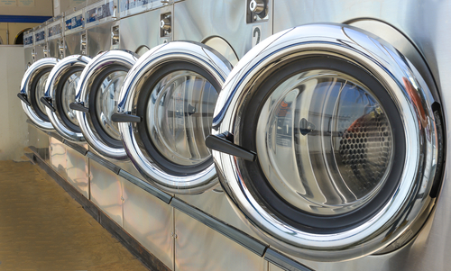 Front facing energy efficient washers in a laundromat