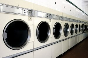An example of antiquated coin-operated laundry machines